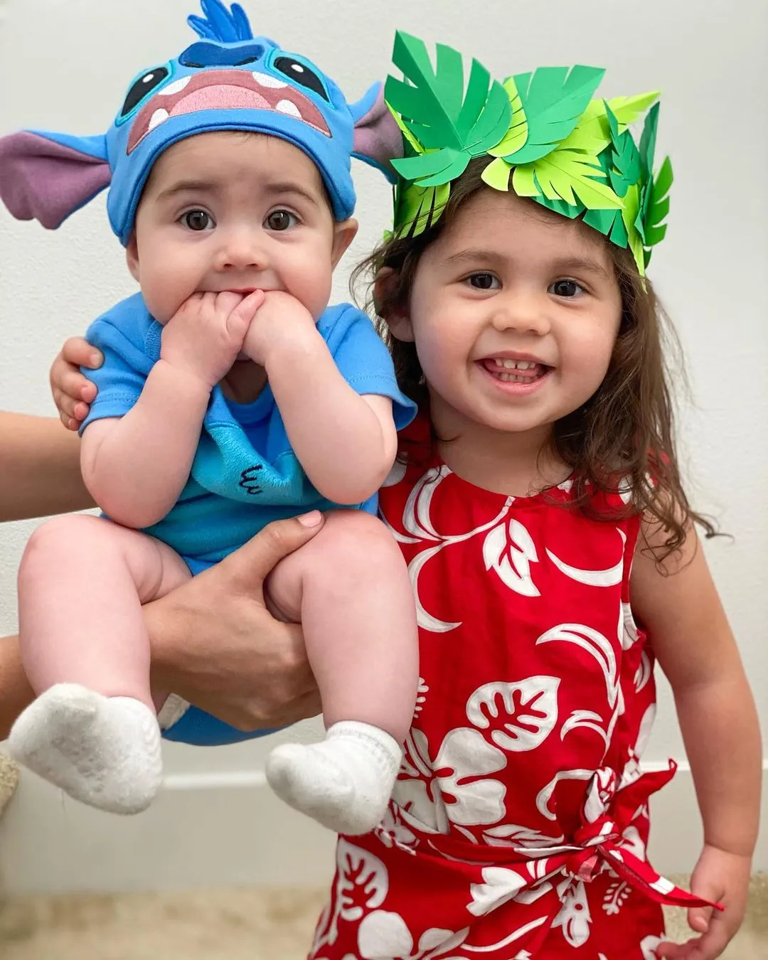 toddler and baby sibling Halloween costumes Moana and Stitch