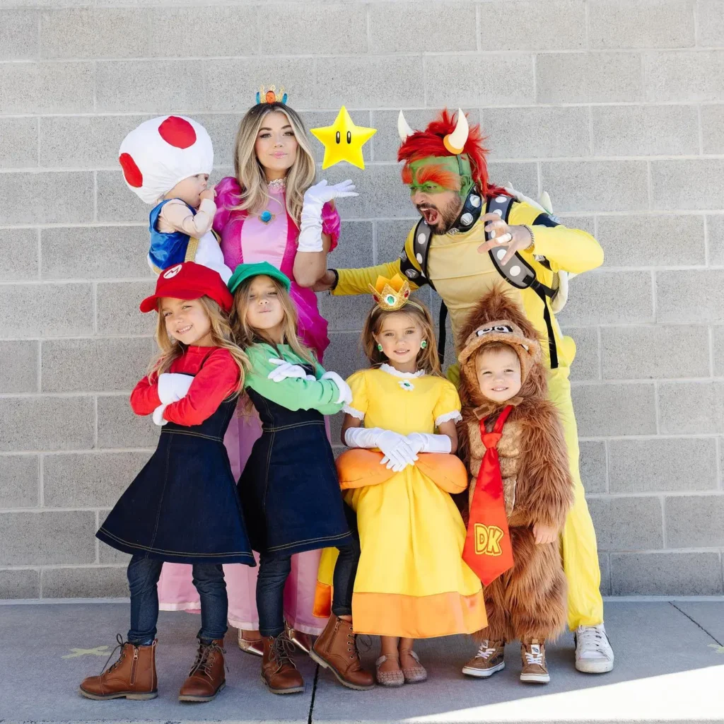 family of 7 Halloween costumes with Mario Brothers costumes